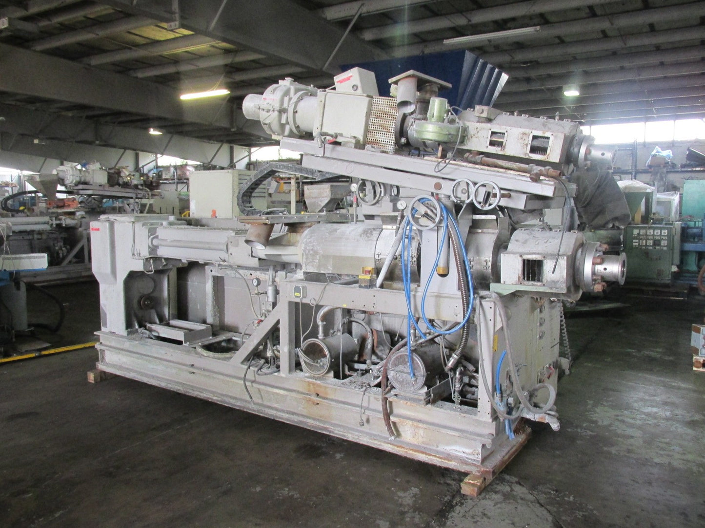 Krauss Maffei KMD2-90 twin screw extruder