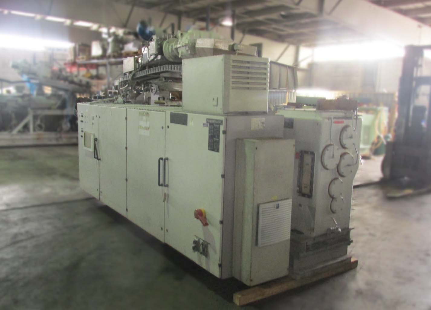 Krauss Maffei KMD 2-90 twin screw extruder