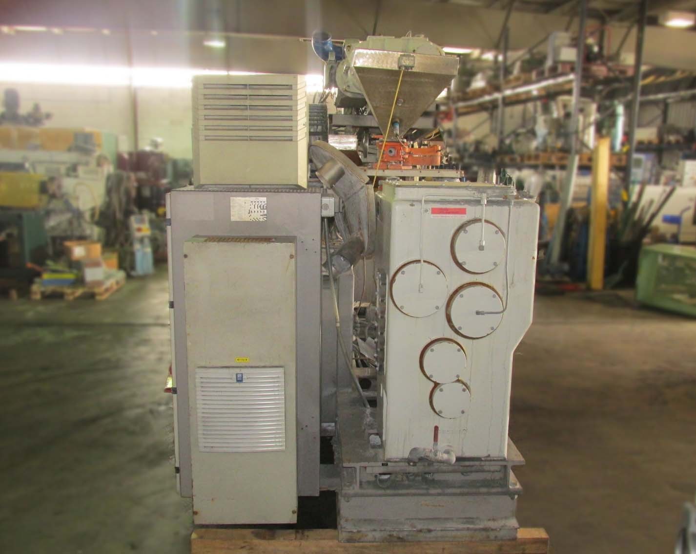 Krauss Maffei KMD 2-90 twin screw extruder