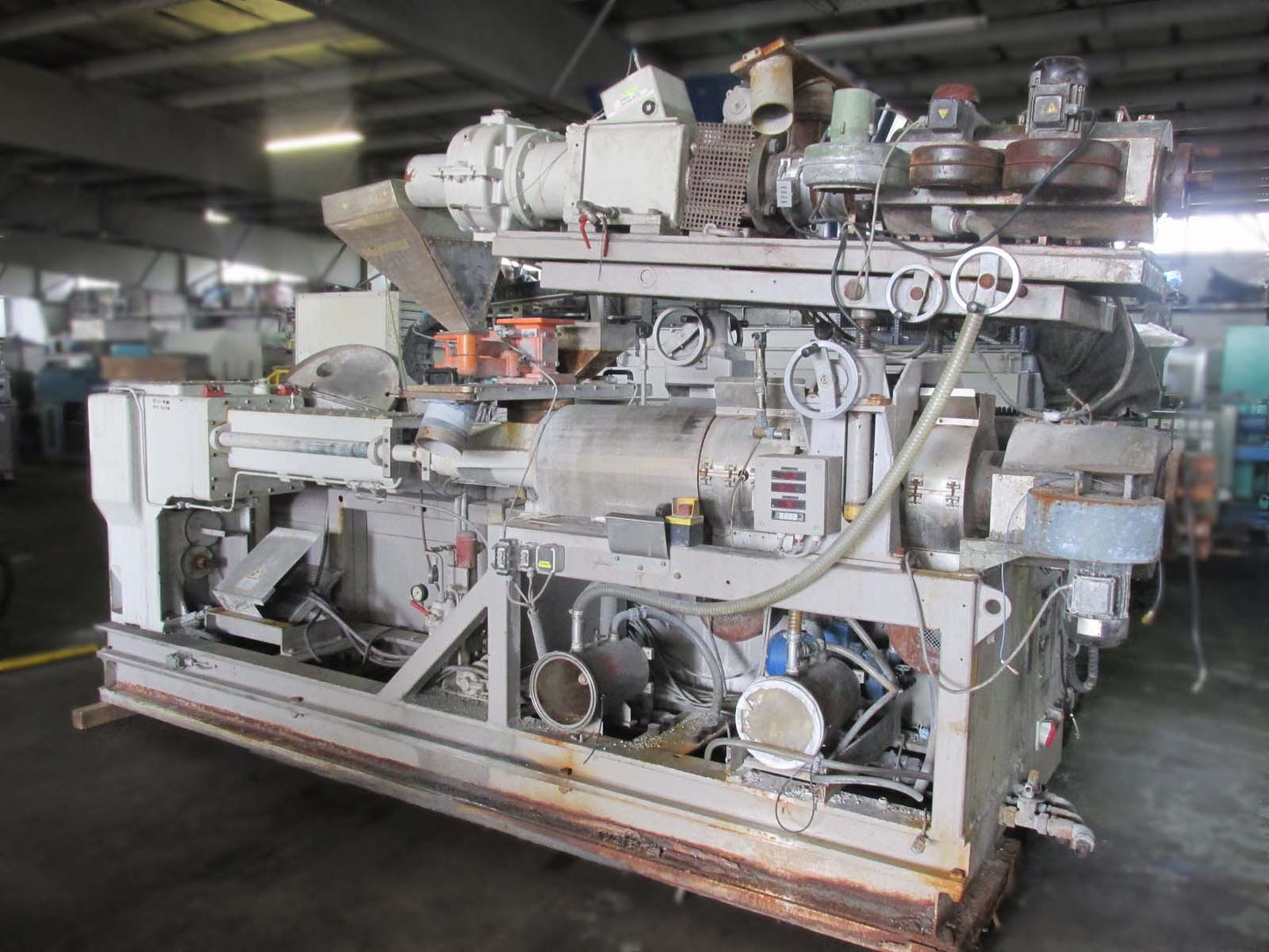 Krauss Maffei KMD 2-90 twin screw extruder