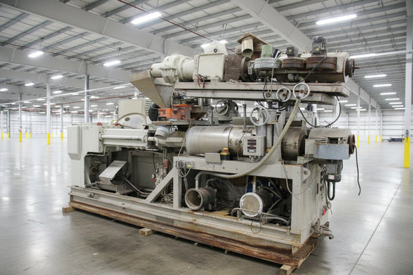 Krauss Maffei KMD 2-90 twin screw extruder