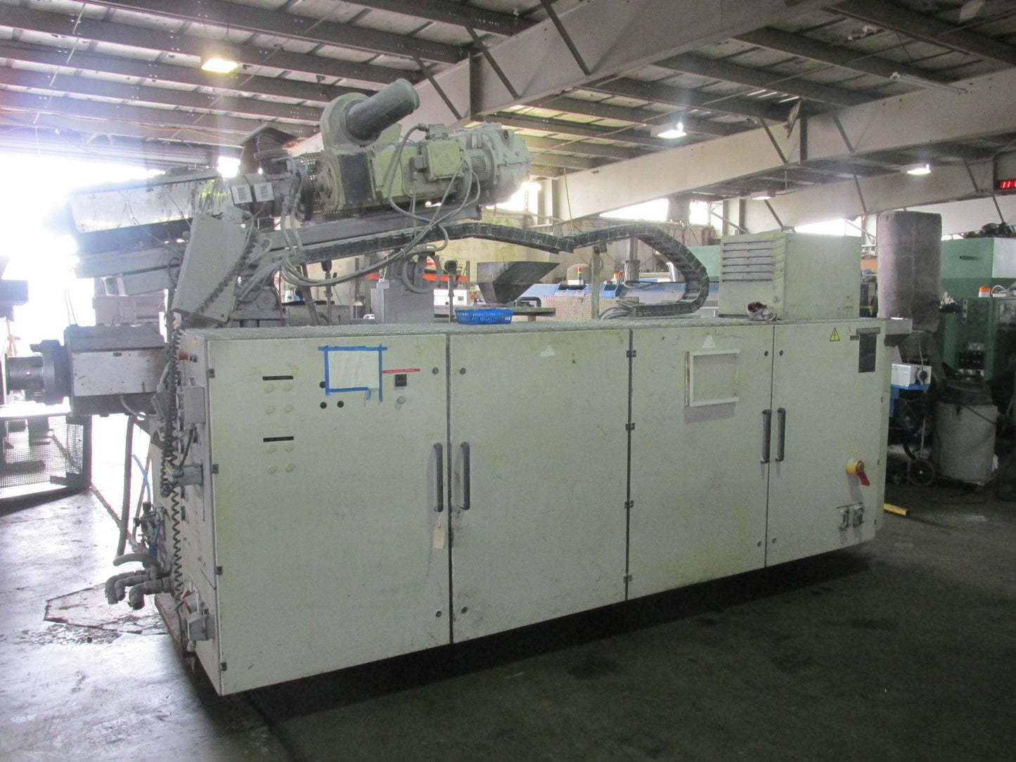 Krauss Maffei KMD2-90 twin screw extruder